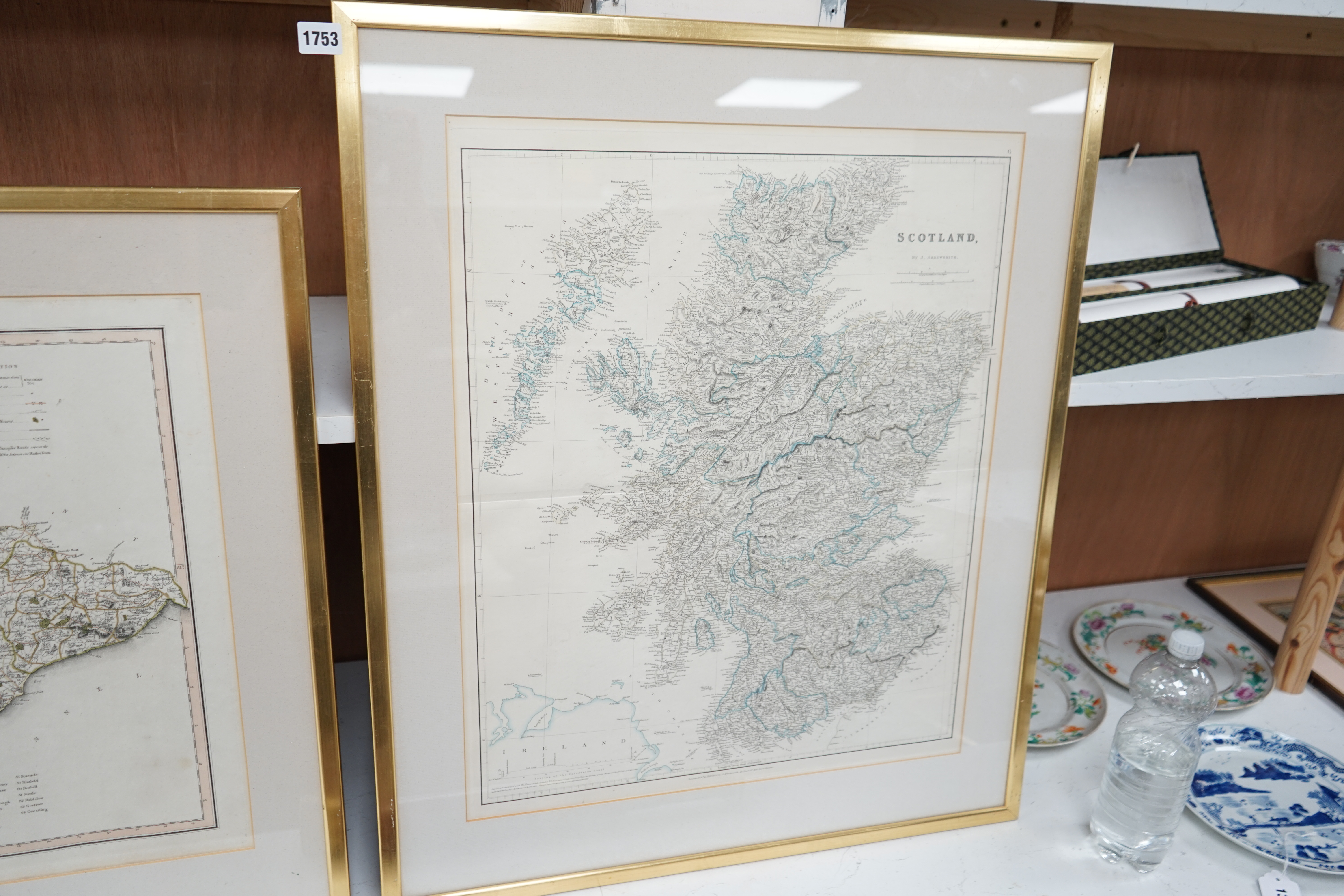 Two 19th century maps, comprising: Scotland by J Arrowsmith, published London 15th February 1834 and a New Map of The County of Sussex printed for C Smith, 6th January 1801, largest 63 x 51cm. Condition - poor to fair, s